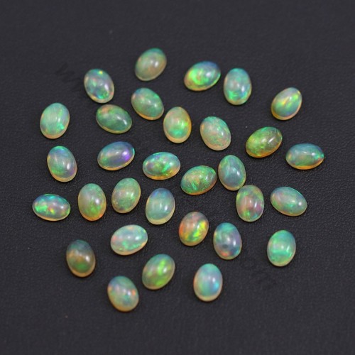 Ethiopian opal in cabochon, multicolored, in oval shape, 5 * 7mm x 1pc
