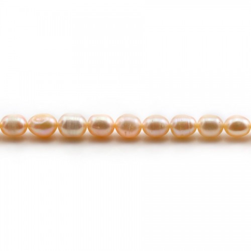 Perles d'eau douce couleur saumon, de forme ovale, 6 - 6.5mm x 10pcs