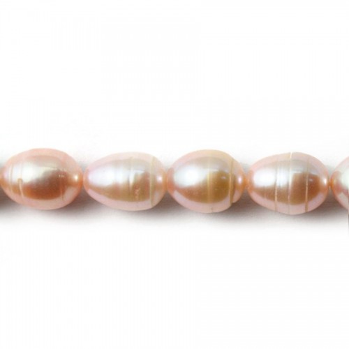 Salmon color oval freshwater pearls on thread 8x10mm x 40cm
