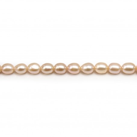 Salmon color oval freshwater pearls on thread 7.5-9mm x 40cm