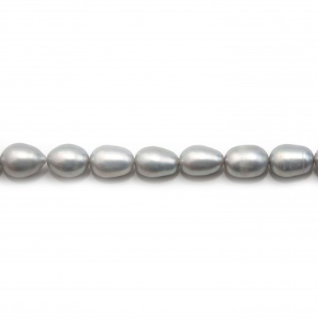 Perles d'eau douce ovales gris clair argenté sur fil 7-8mm x 40cm