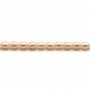 Salmon color oval freshwater pearls on thread5-6mm x 40cm