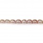 Perles d'eau douce ovales rosé 6-7mm x 40cm