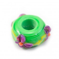 Green glass bead with purple, yellow & orange floral design in relief 15.6mm x 1pc