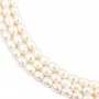Perles d'eau douce blanches ovale 6-7mm x 40cm