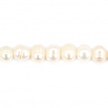 White freshwater pearls on thread 6-7mm x 36cm